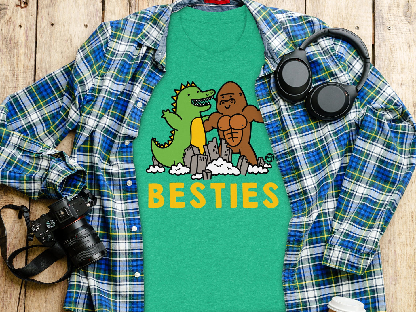 Besties Dinosaur and Muscle Man Graphic T-Shirt product