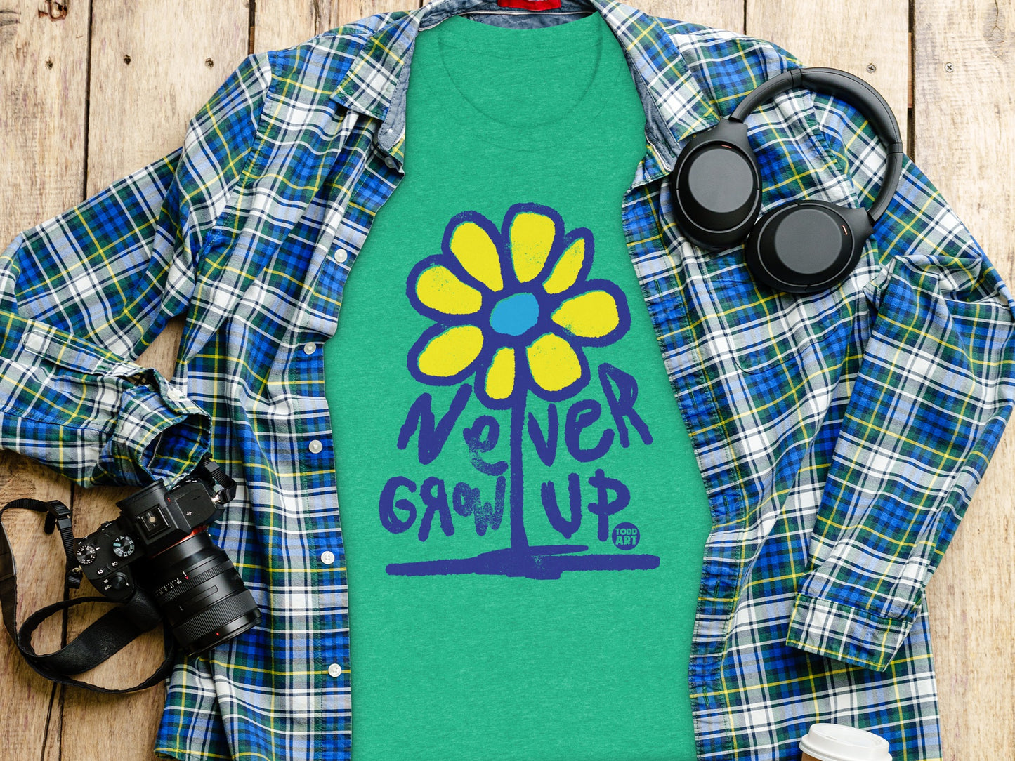 Never Grow Up Flower Artwork on Green Shirt