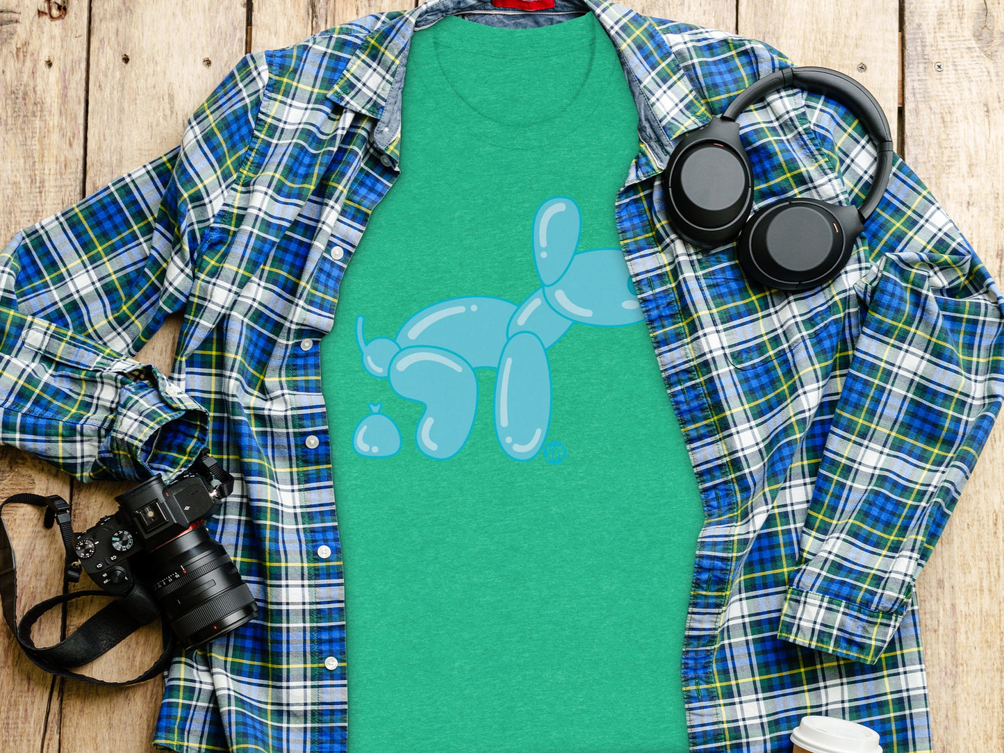 Quirky Balloon Animal Graphic on Green Shirt