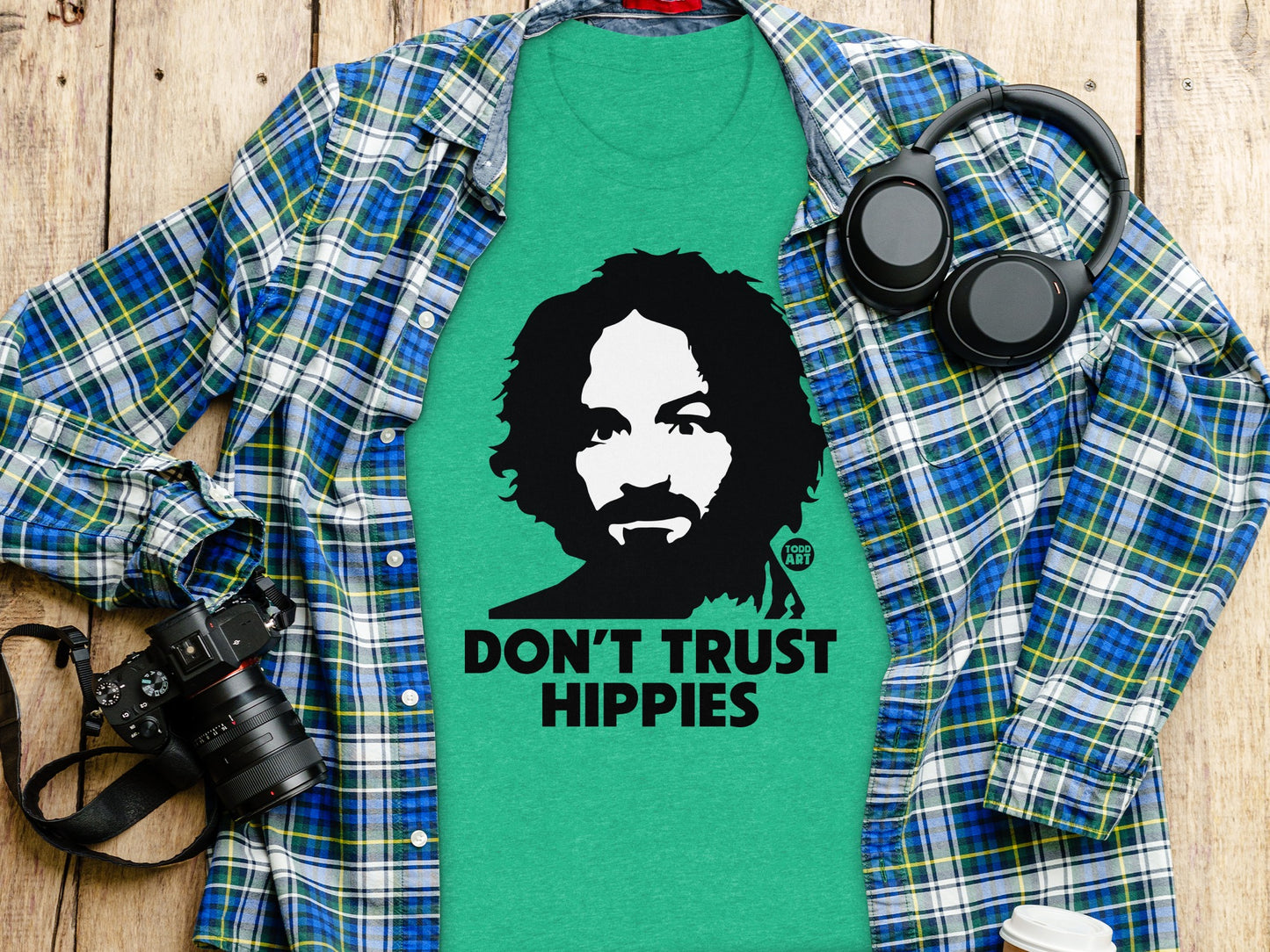 Green T-shirt with Don't Trust Hippies graphic design