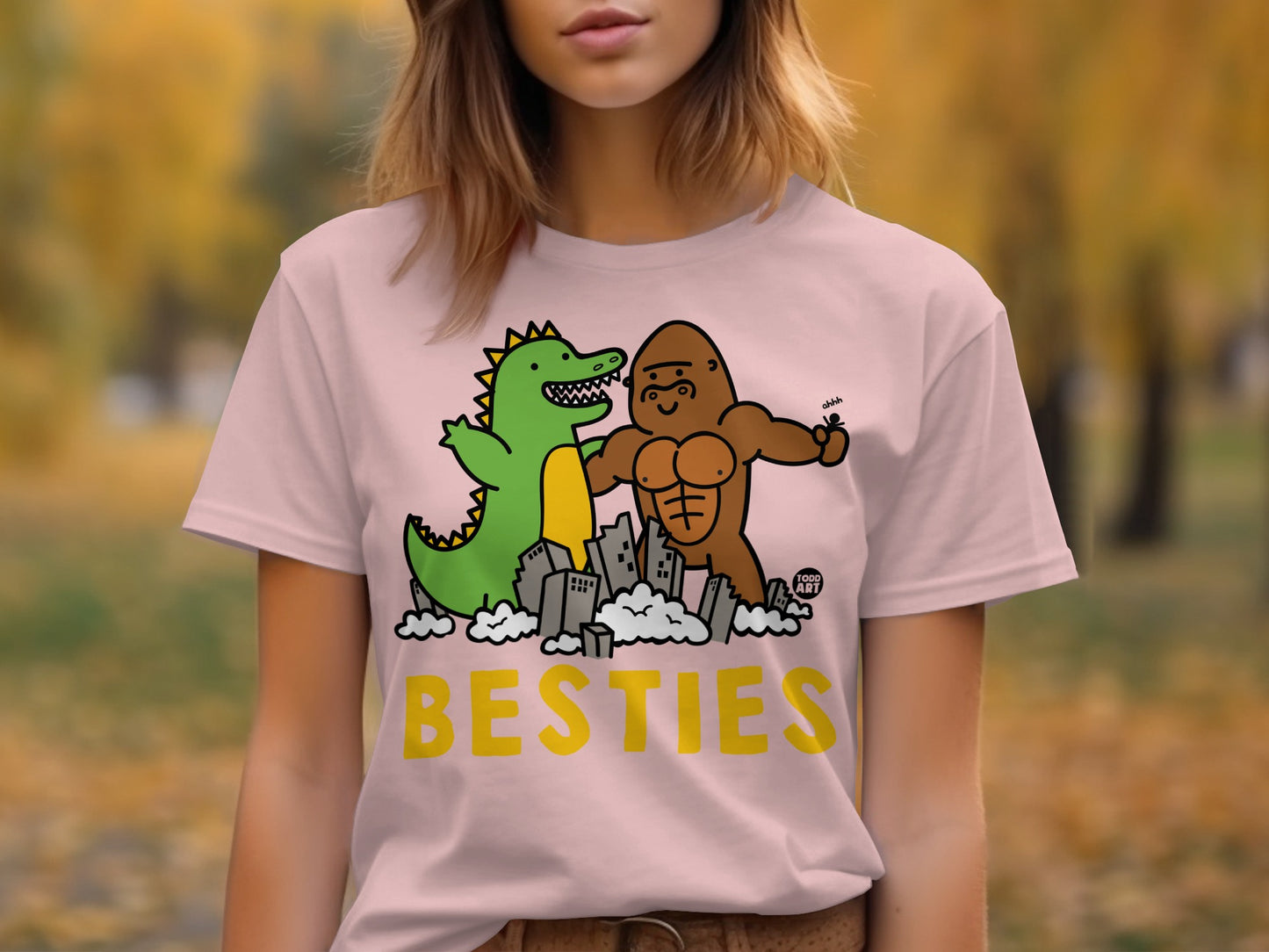 Dinosaur and Strongman Besties Graphic T-Shirt product type