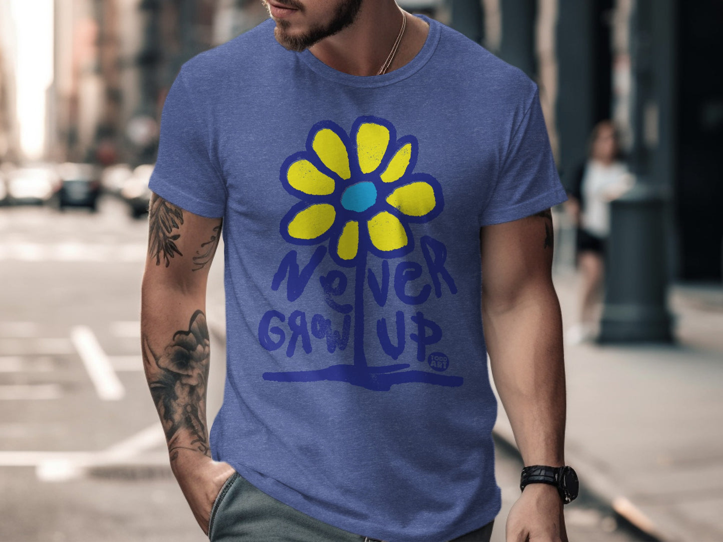 Never Grow Up Blue Shirt with Yellow Flower Design