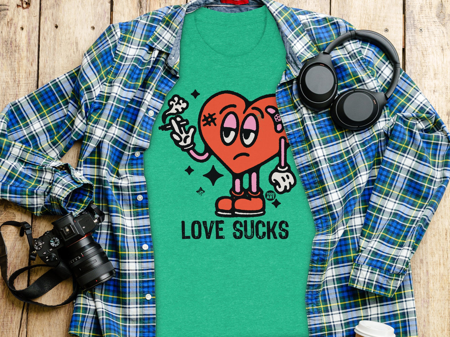 Love Sucks Graphic Tee with Heart Illustration
